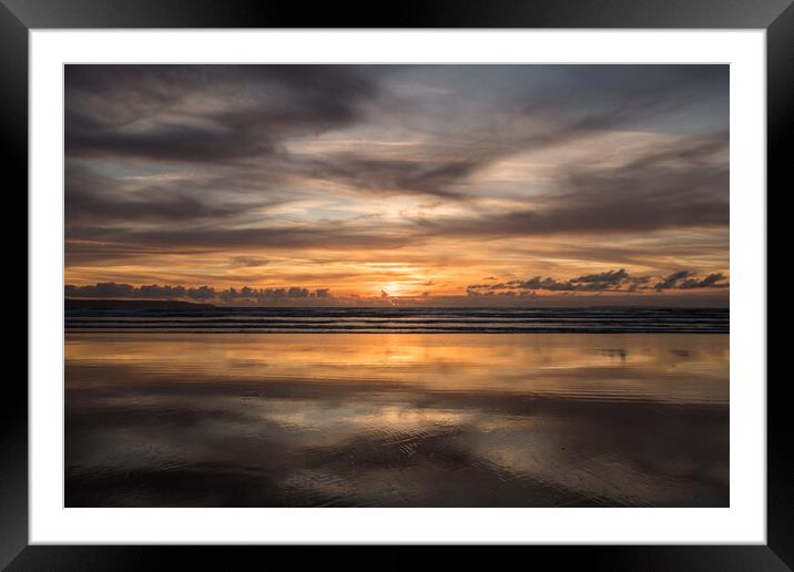 Moody sunset reflections at Westward Ho! Framed Mounted Print by Tony Twyman