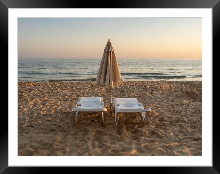 Sun beds on Falesia Beach in Portugal Framed Mounted Print by Tony Twyman