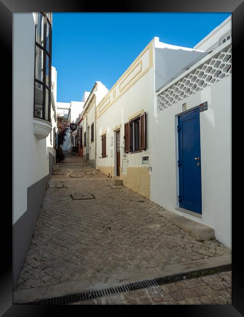 The cobbled streets of Albufeira Framed Print by Tony Twyman