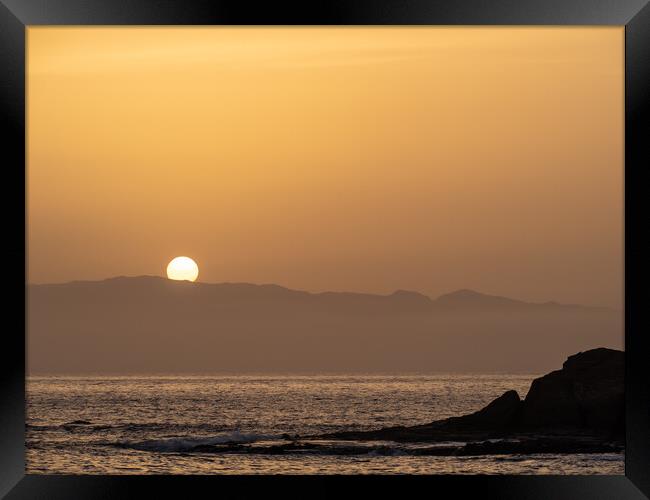 Sun setting behind La Gomera Framed Print by Tony Twyman
