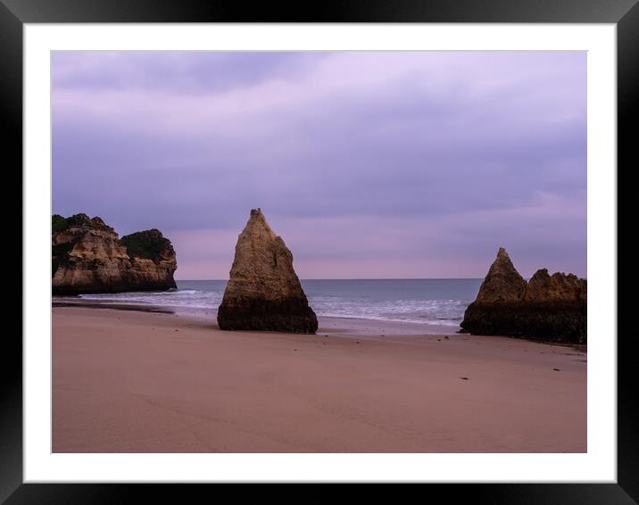 Rock stacks on Alvor beach Framed Mounted Print by Tony Twyman