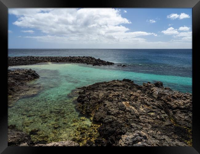 An Azure Lagoon Framed Print by Tony Twyman