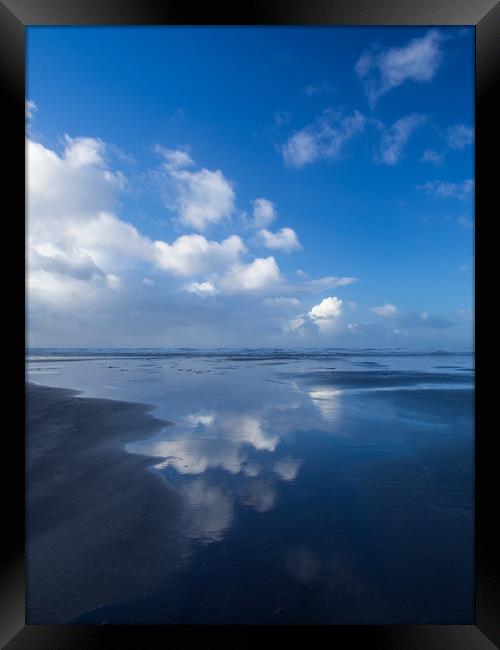 Wonderful cloud reflections on Westward Ho beach Framed Print by Tony Twyman