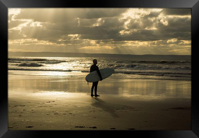 Surfer watching the waves at Croyde Bay in Devon Framed Print by Tony Twyman