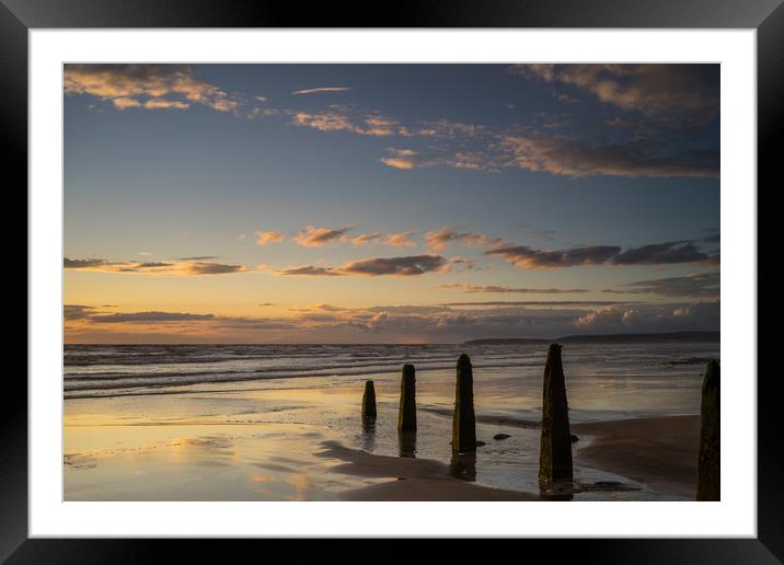 Sunset beach Groynes Framed Mounted Print by Tony Twyman