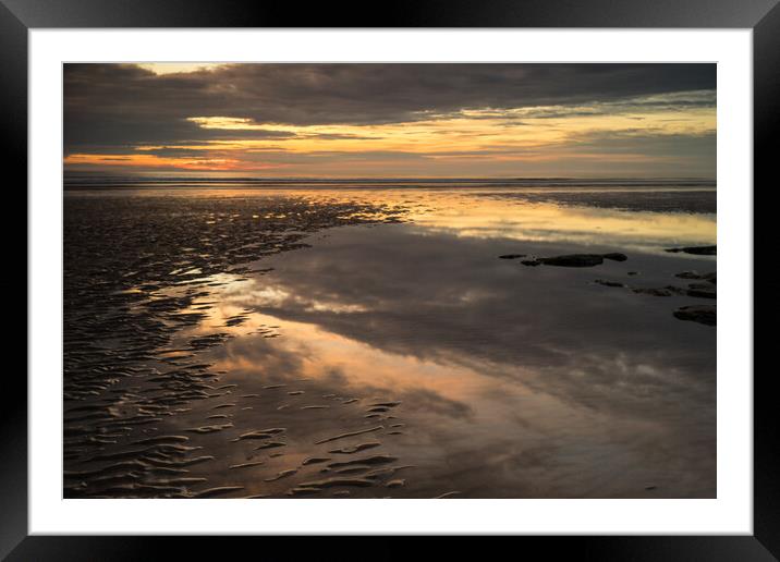 Moody sunset reflections Framed Mounted Print by Tony Twyman