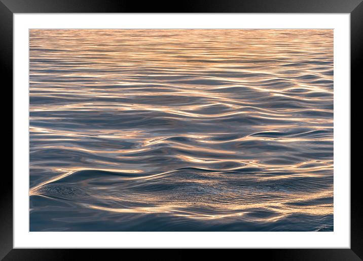 Close-up of soft sea waves at sea at sunset gold h Framed Mounted Print by RUBEN RAMOS