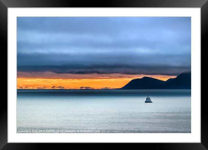 The Bering sea and under s stormy sky at sunset. Framed Mounted Print by RUBEN RAMOS