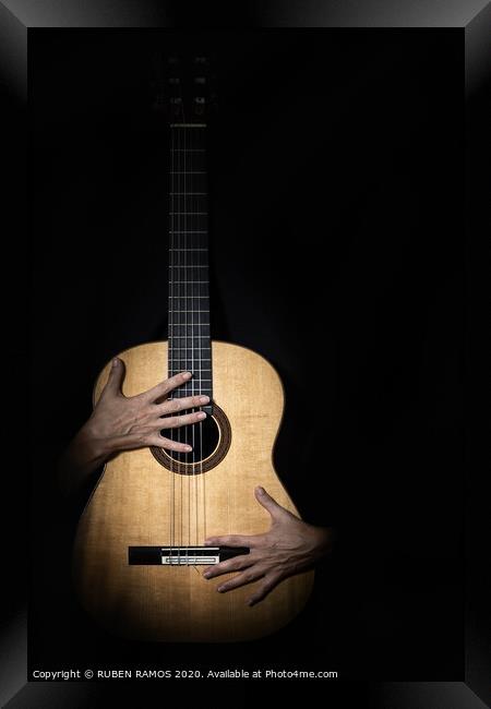 Female hands on guitar. Framed Print by RUBEN RAMOS