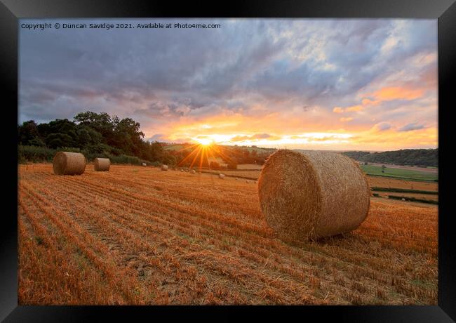 Harvest time sunset Framed Print by Duncan Savidge