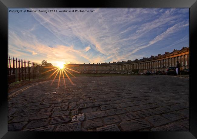 sun star over the cobbles of Bath's Royal Crescent Framed Print by Duncan Savidge