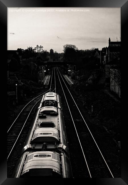 Heading home on the rails Framed Print by Duncan Savidge