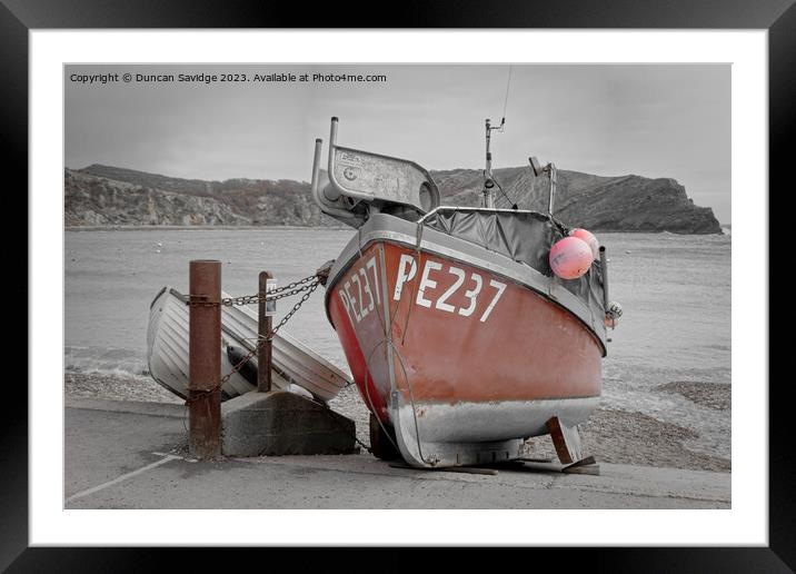 Fishing boat at Lulworth Cove colout splash Framed Mounted Print by Duncan Savidge