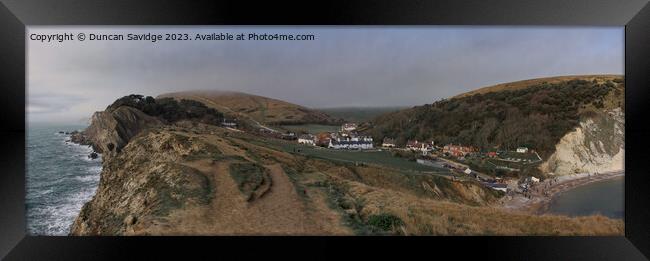 Looking inland towards Lulworth Cove village Framed Print by Duncan Savidge