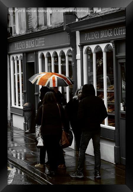 Pulteney Bridge coffee shop in the rain Framed Print by Duncan Savidge