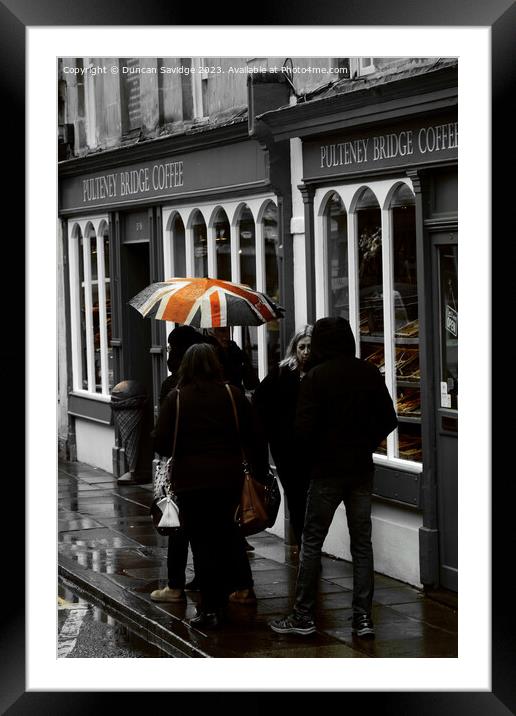 Pulteney Bridge coffee shop in the rain Framed Mounted Print by Duncan Savidge