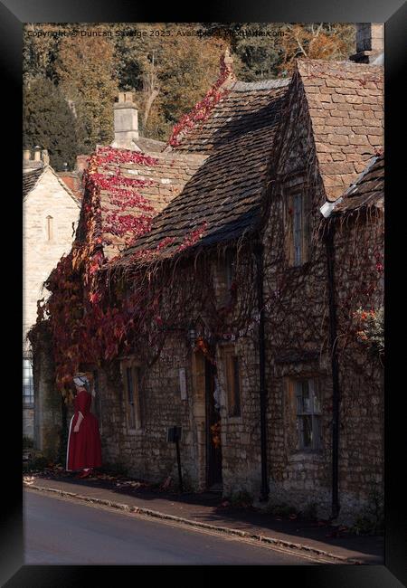 Red Autumn leaves at Castle Combe  Framed Print by Duncan Savidge