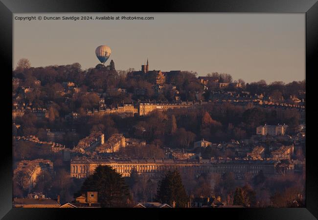 Hot air balloon floats over the golden Royal Crescent in winter  Framed Print by Duncan Savidge