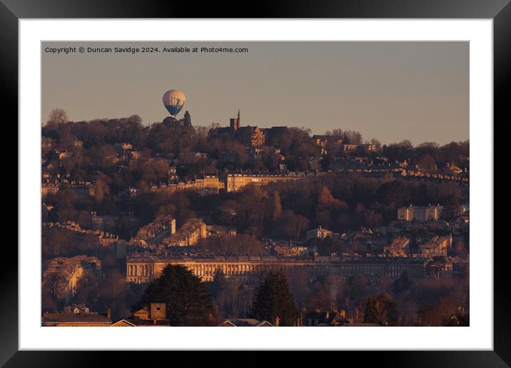 Hot air balloon floats over the golden Royal Crescent in winter  Framed Mounted Print by Duncan Savidge