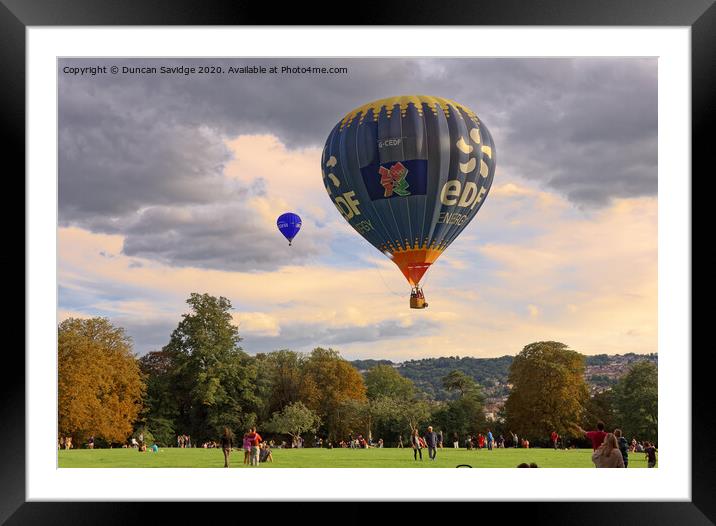 Hot air balloon lifting off from Royal Victoria Park Bath Framed Mounted Print by Duncan Savidge