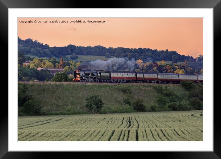 Steam train in the late evening sun Framed Mounted Print by Duncan Savidge