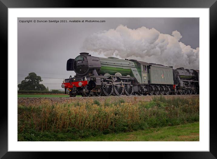 Flying Scotsman steam train with black 5 moody clo Framed Mounted Print by Duncan Savidge