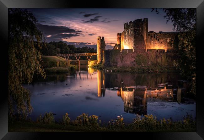 Caerphilly Castle with noctilucent clouds Framed Print by Warren Evans