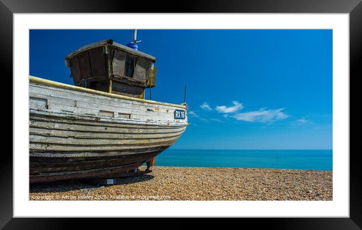 Fishing boat at Hastings beach Framed Mounted Print by Adrian Rowley