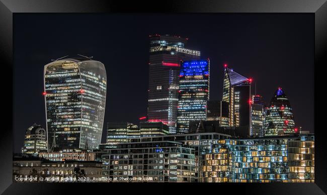 The City of London at nightfall Framed Print by Adrian Rowley
