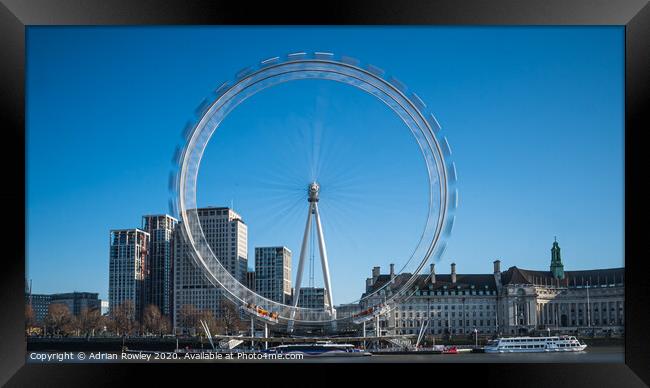The London Eye in motion Framed Print by Adrian Rowley