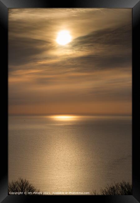 Moody sunrise in Looe Bay Framed Print by Jim Peters