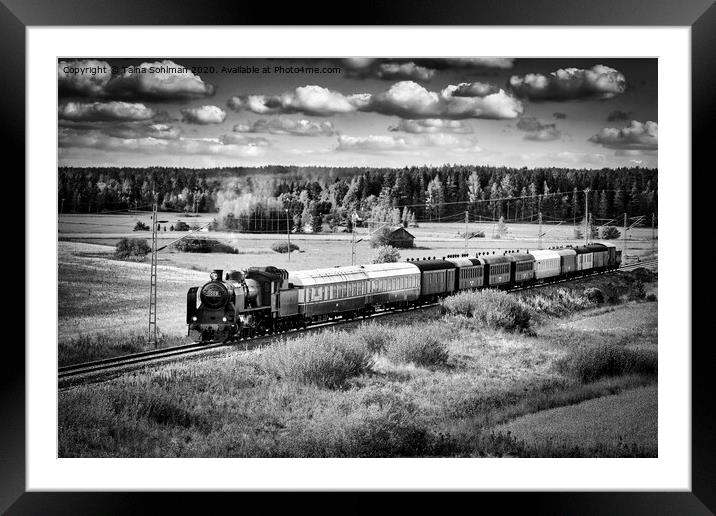 Steam Train Travels Through Countryside  Framed Mounted Print by Taina Sohlman