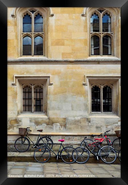 Bicycles parked along the pavement in Cambridge Framed Print by Mehul Patel