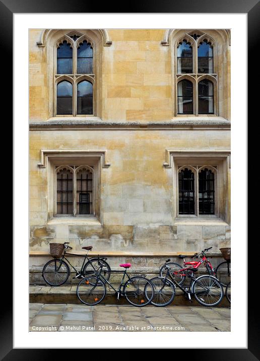 Bicycles parked along the pavement in Cambridge Framed Mounted Print by Mehul Patel