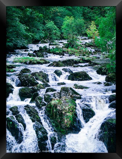 Waterfall surrounded by trees - Swallow Falls Framed Print by Mehul Patel