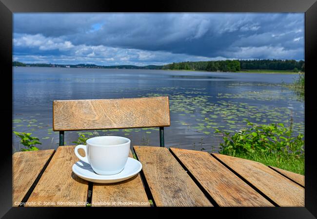 coffee cup on wooden table near lake Framed Print by Jonas Rönnbro