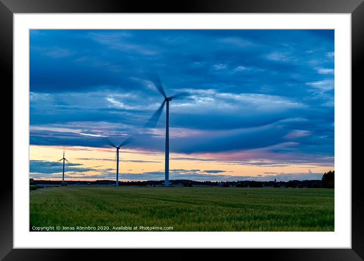 big windmills on field with dramatic sky Framed Mounted Print by Jonas Rönnbro