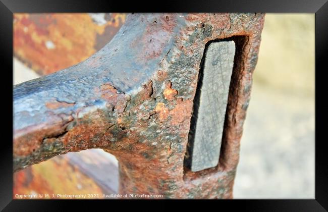 A close up of a piece of rust Framed Print by M. J. Photography