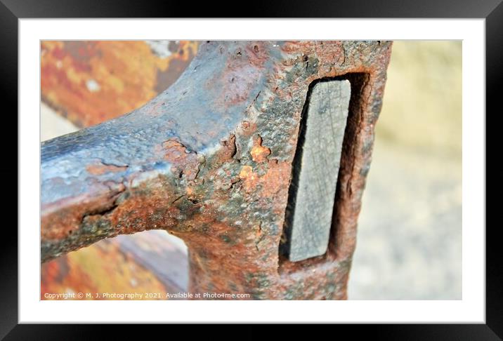 A close up of a piece of rust Framed Mounted Print by M. J. Photography