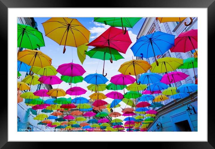 A colorful umbrella Framed Mounted Print by M. J. Photography