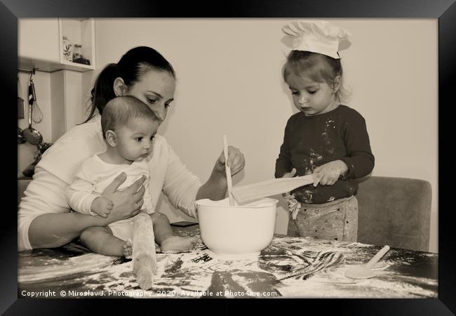 Baker family, Mum with two kids in the kitchen Framed Print by M. J. Photography