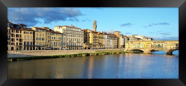 The Ponte Vecchio bridge over the Arno River, in F Framed Print by M. J. Photography