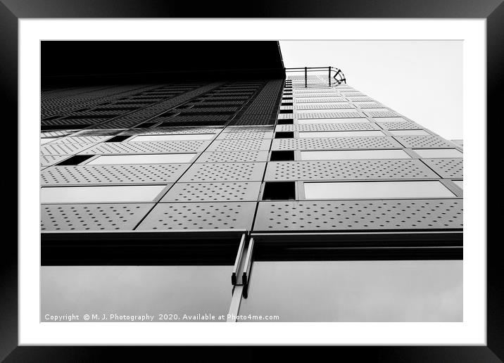 Modern and tall office buliding with sky over top Framed Mounted Print by M. J. Photography