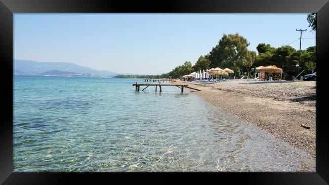 Greek beaches have become synonymous with luxury a Framed Print by M. J. Photography