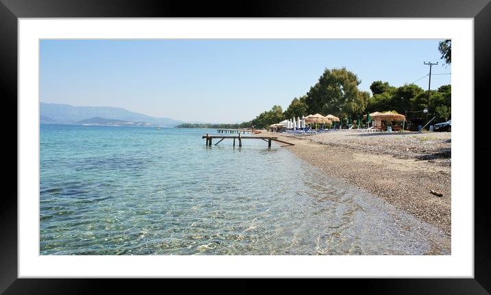 Greek beaches have become synonymous with luxury a Framed Mounted Print by M. J. Photography