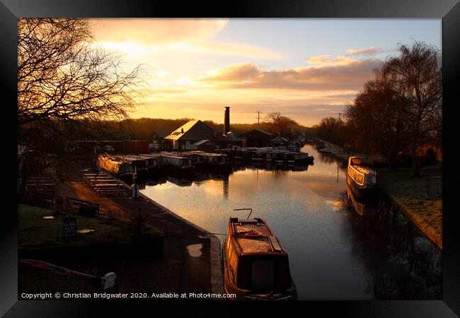 Barges at sunrise at Norbury Junction on the Shropshire Union Canal in Staffordshire, England, UK Framed Print by Christian Bridgwater