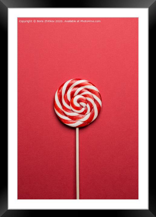 Lollypop on red background. Framed Mounted Print by Boris Zhitkov