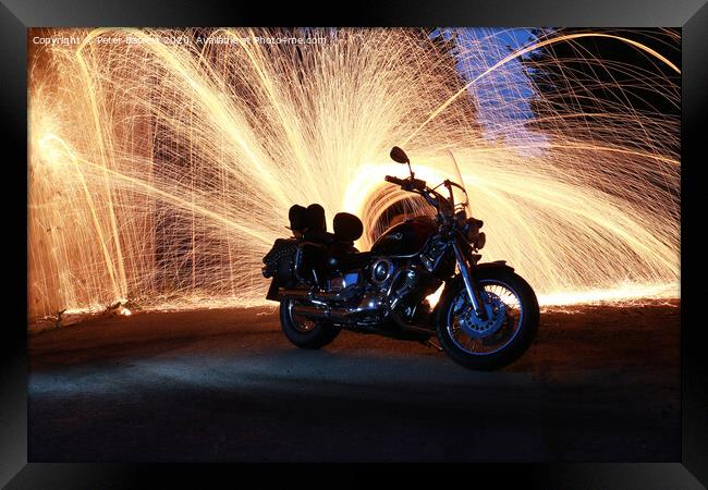 Sports Bike with Sparks Behind Framed Print by Peter Barrett