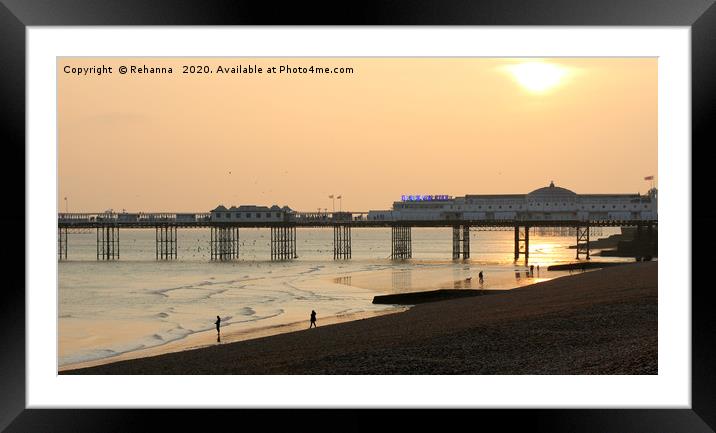 Sunset over Brighton pier Framed Mounted Print by Rehanna Neky