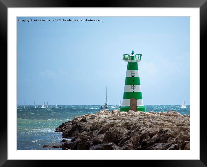 Sailboats speed past Vilamoura Lighthouse, Portuga Framed Mounted Print by Rehanna Neky